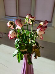 Bouquet of dried roses in a vase, bouquet of roses