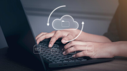 Document Management Data System (DMS) concept. Businessman working with laptop computer with cloud and document icons on virtual screen upload, download.