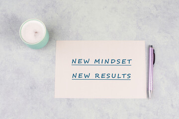 New mindset new results is standing on a paper, coaching strategy, optimistic and positive...
