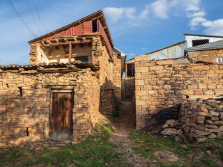 Narrow shady streets of a mountain village. Old mountain village