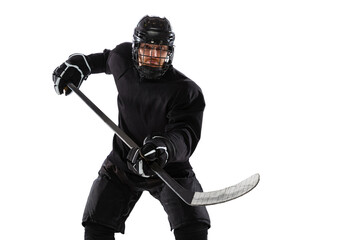 Counterattack. Professional male hockey player training in special uniform with helmet isolated...