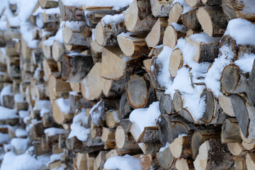 Snow on a Pile of Firewood