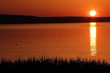 Golden sunset over the lake