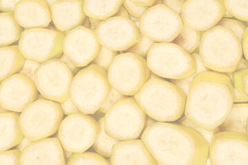 Fresh banana slices background. Top view.