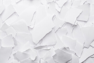 Empty white paper pieces as a background.