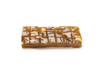 Turkish traditional delight with nuts isolated on white background.