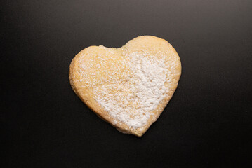 Shortbread in the shape of a heart isolated on white background.