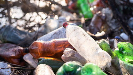 Ground littered with plastic bottles