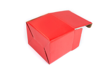 Empty red paper box on a black background