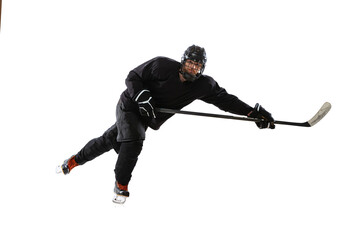 Winning game. Portrait of concentrated man, professional hockey player in motion, training isolated over white background.