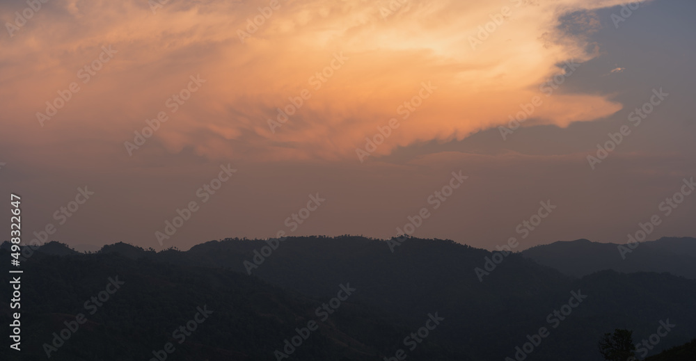 Canvas Prints silhouette and panorama layer of mountain with sunset background