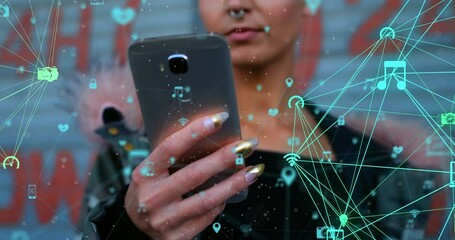 Animation of neworks of connections with icons over caucasian woman using smartphone