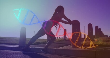 Animation of dna strand over biracial woman exercising in park - Powered by Adobe