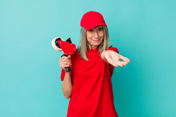 senior gray hair woman smiling happily with friendly and  offering and showing a concept. packer...
