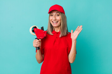 senior gray hair woman feeling happy, surprised realizing a solution or idea. packer employee...