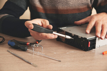 man hand tool with processor on table