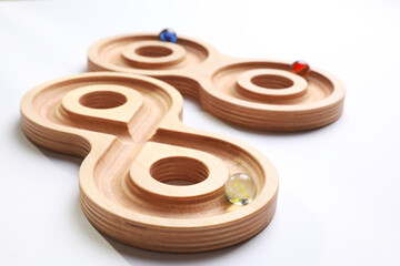 Labyrinth balance boards on white background, closeup. Montessori toy
