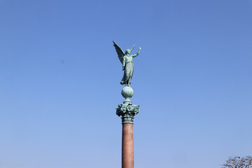 Fototapeta na wymiar Statue Angel Against Sky Copenhagen Denmark 