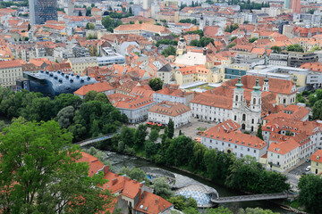Fototapeta na wymiar View from the Castle Mountain over the roofs to the city of Graz situated at the River Mur 