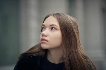 brunette girl walking on street