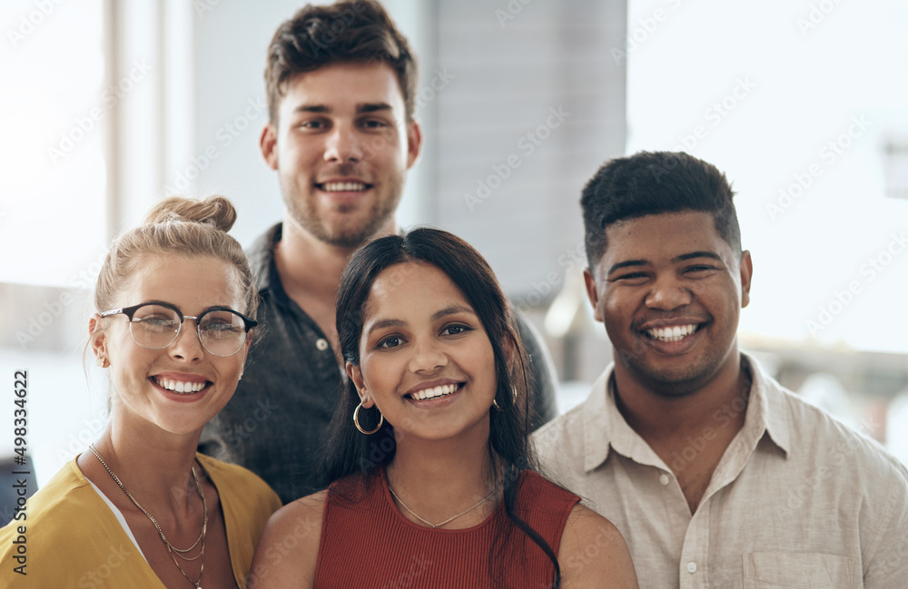 Poster we always keep optimism on our side. portrait of a group of businesspeople standing together in an o