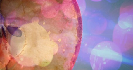 Animation of light spots over apple