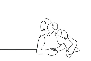 a mother and her son are hugging each other and sitting at home