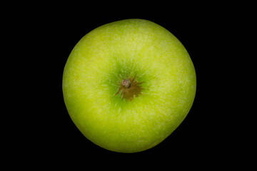 Fresh green apple and sliced isolated on black background.