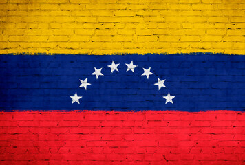 Venezuela flag painted on brick wall. National country flag background photo