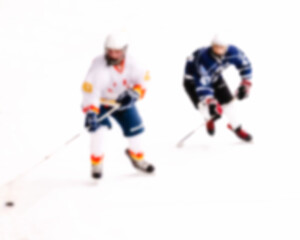 Defocus opposition of hockey players on ice during match - blurred background of hockey match - rivalry in sports