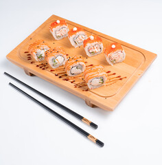 Japanese cuisine. Sushi set of nigiri and maki rolls served. Top view