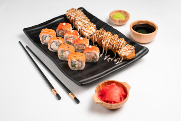 Japanese cuisine. Sushi set of nigiri and maki rolls served. Top view