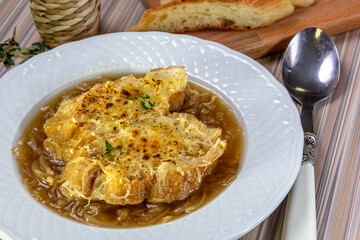 Classic French onion soup baked with cheese croutons