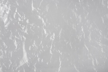 Abstract background of crumpled polyethylene film.