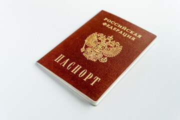 Russian passport in blur on white background. Side view.