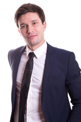young white handsome man in a shirt strict office suit stands isolated on a white background