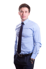 young white handsome man in a shirt strict office suit stands isolated on a white background