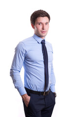 young white handsome man in a shirt strict office suit stands isolated on a white background