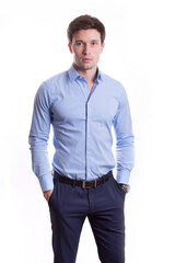 young white handsome man in a shirt strict office suit stands isolated on a white background