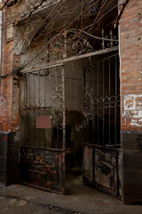 old, iron, scribbled gates in an old house
