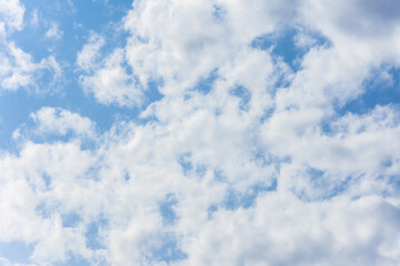 Clouds are scattered white texture with blue sky.