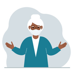 Grandmother in a protective medical face mask. The old woman wears protection against viruses, urban air pollution, smog, vapors, and polluting gas emissions.