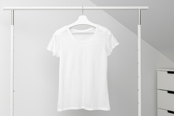 T-shirt hanging on Clothing rack. Round neck white color. Template, mock up