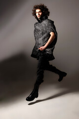 Fashion Model Posing, In Motion In Studio