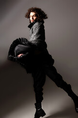 Fashion Model Posing, And  and Looking Confident In Studio