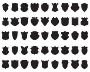 Black silhouettes of shields on white a background