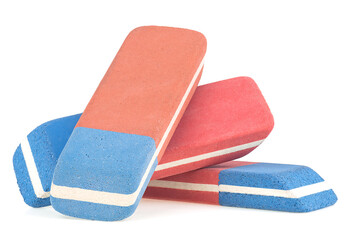 Stack of erasers isolated on a white background, close up.