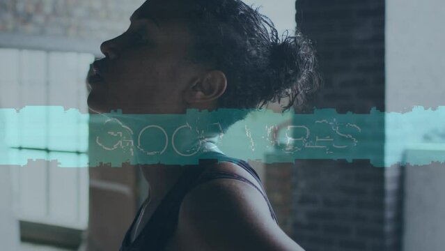 Animation of good vibes text over african american sportswoman at gym