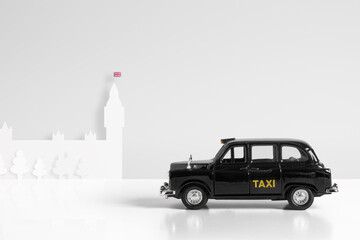 Black Model taxi & houses of parliament London concept