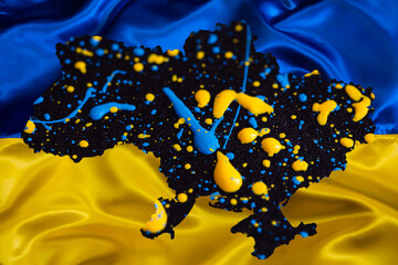 Outline Map of Ukraine with waving Ukrainian national flag